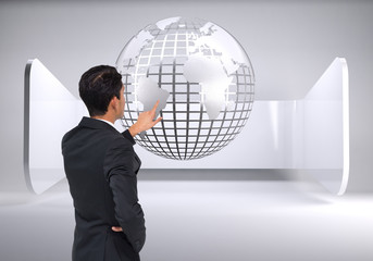 Aufkleber - Composite image of asian businessman pointing