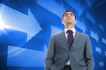 Poster - Composite image of unsmiling businessman standing