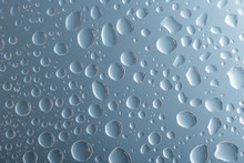 Clear Gray Water Drops Over Gray Background