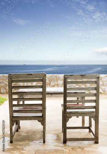 Naklejka dekoracyjna old wooden chairs and table