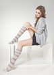 © matusciac - beautiful woman with long sexy legs in winter socks posing