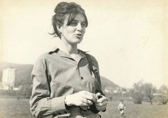 Wall Mural - Young woman in shirt - circa 1965