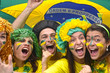 Group happy brazilian soccer fans commemorating victory.