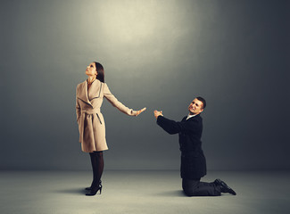 Canvas Print - man standing on his knees and apologizing