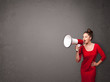 © ra2 studio - Girl shouting into megaphone on copy space background