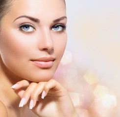 Wall Mural - beauty portrait. beautiful spa woman touching her face