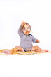 © StefanieBaum - Baby spielt mit Nudeln