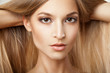 © julenochek - Woman with long straight blond hairs