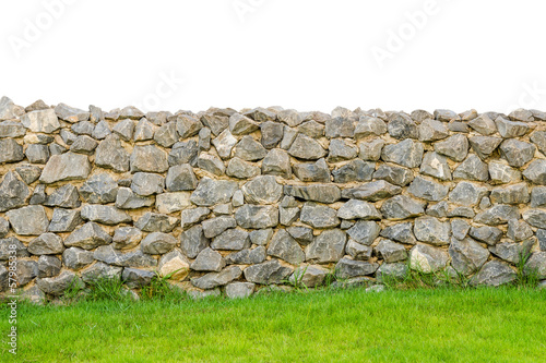 Cuadros en Lienzo fence real stone wall surface with cement on green grass field