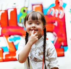 Portrait of beautiful young girl on the playground.