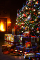 Christmas Tree and Christmas gift boxes in the interior with a f