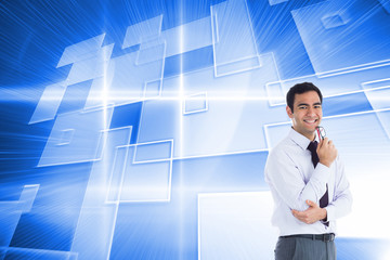 Poster - Composite image of smiling businessman holding glasses