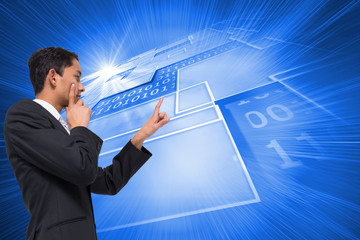 Poster - Composite image of thoughtful asian businessman pointing