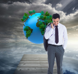 Poster - Composite image of smiling businessman standing