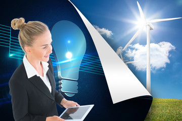 Poster - Composite image of businesswoman holding new tablet