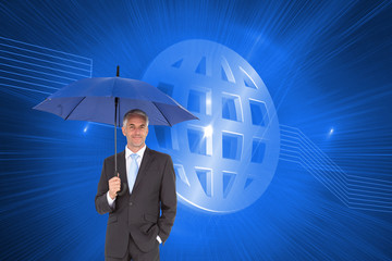 Poster - Composite image of businessman smiling at camera and holding blu