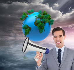 Poster - Composite image of smiling businessman holding a megaphone