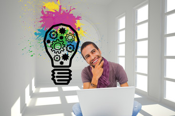Fototapete - Composite image of thinking man sitting on floor using laptop an