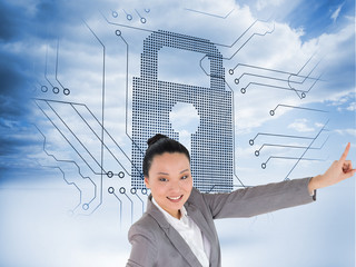 Aufkleber - Composite image of smiling asian businesswoman pointing