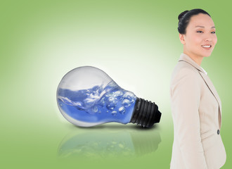 Poster - Composite image of smiling asian businesswoman