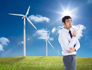 Poster - Composite image of thinking businessman holding glasses