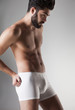 © matusciac - sexy handsome naked man in underwear posing in the studio