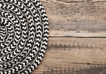 marine roll ropes and chain on wooden background