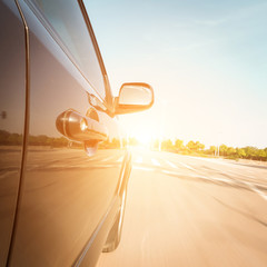 Wall Mural - car on the road with motion blur background