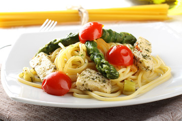 Wall Mural - Pasta with swordfish, asparagus and cherry tomatoes