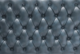 Fototapeta Sypialnia - Superficie tapizada de cuero acolchado azul