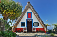 Front Of A Traditional Cottage In Santana (Madeira, Portugal)