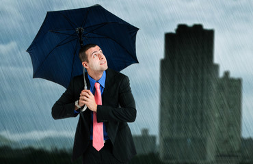 businessman under an umbrella