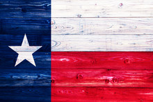 Flag Of Texas On Wooden Surface