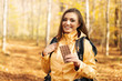 © gpointstudio - Smiling female hiker with dark chocolate