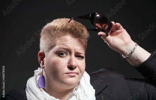 Portrait Of Chubby Woman With Short Hair And Sunglasses Buy This