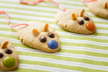 Wall Mural - Cookies with mouse shaped and red licorice tail