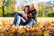 Happy Young Couple In Autumn Park