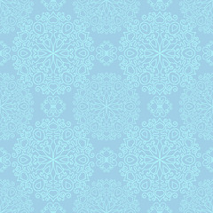 Wall Mural - Blue seamless pattern with delicate snowflakes