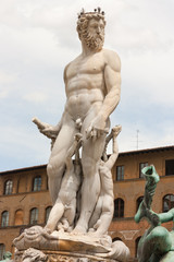 Florence - Statue of Neptune near fountain in Piazza della Signo