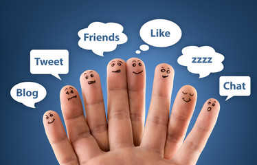 Happy group of finger smileys with social chat sign and speech b