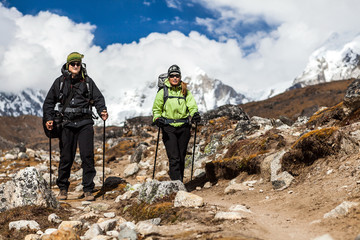 Wall Mural - Couple walking and hiking in Himalaya Mountains