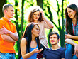 © Gennadiy Poznyakov - Group student with notebook outdoor.