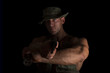 © Eskymaks - Soldier holding gun and flashlight.