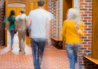 Poster - Blurred students walking through corridor