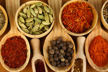 Wall Mural - Many different spices and fragrant herbs close-up background