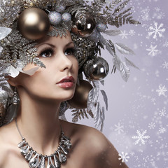 Christmas Woman with New Year Decorated Hairstyle. Snow Queen.