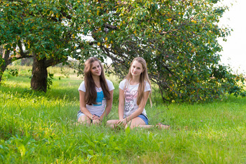 Two teen girls in the park