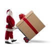 © alphaspirit - Santa Claus with big Christmas present