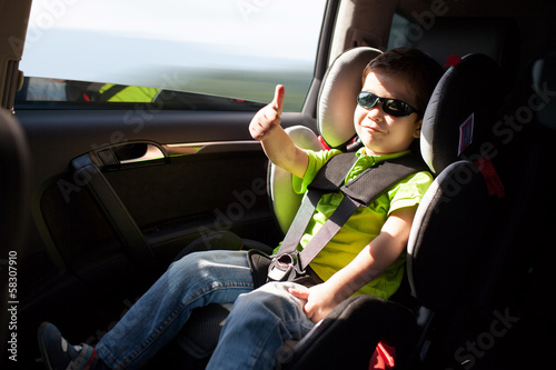 Fotomural Luxury baby car seat for safety with happy kid