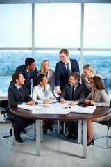 Poster - Business team at meeting